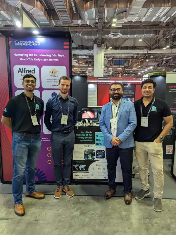 The team at the booth. ROSCon & SWITCH