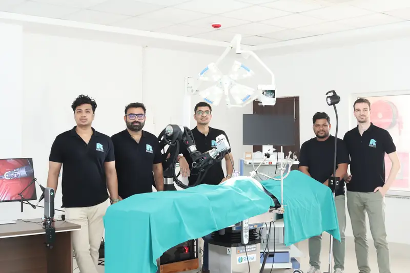 The team with the robot in the operating room. Hon’ble CM of Assam unveiling Project Atharv, Phase 1