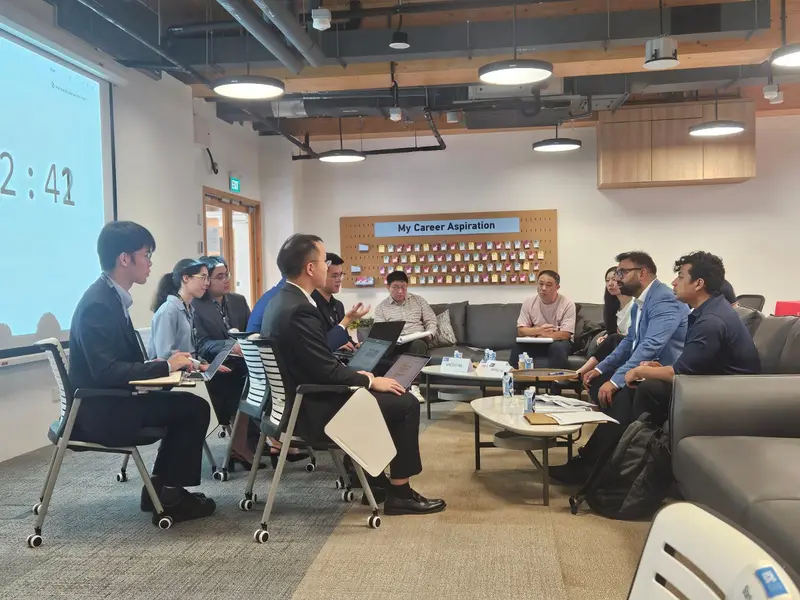 In discussion during the competition. Winners at VCIC Asia Regional Finals